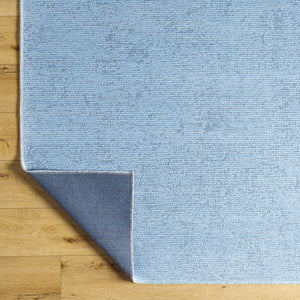 Isako Blue Solid Washable Area Rug - Clearance
