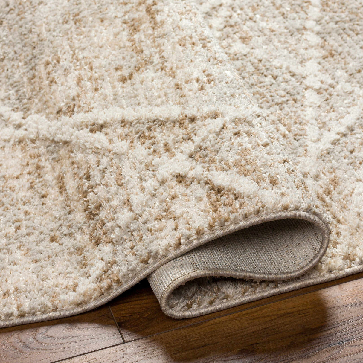 Hosea Brown Area Rug - Clearance